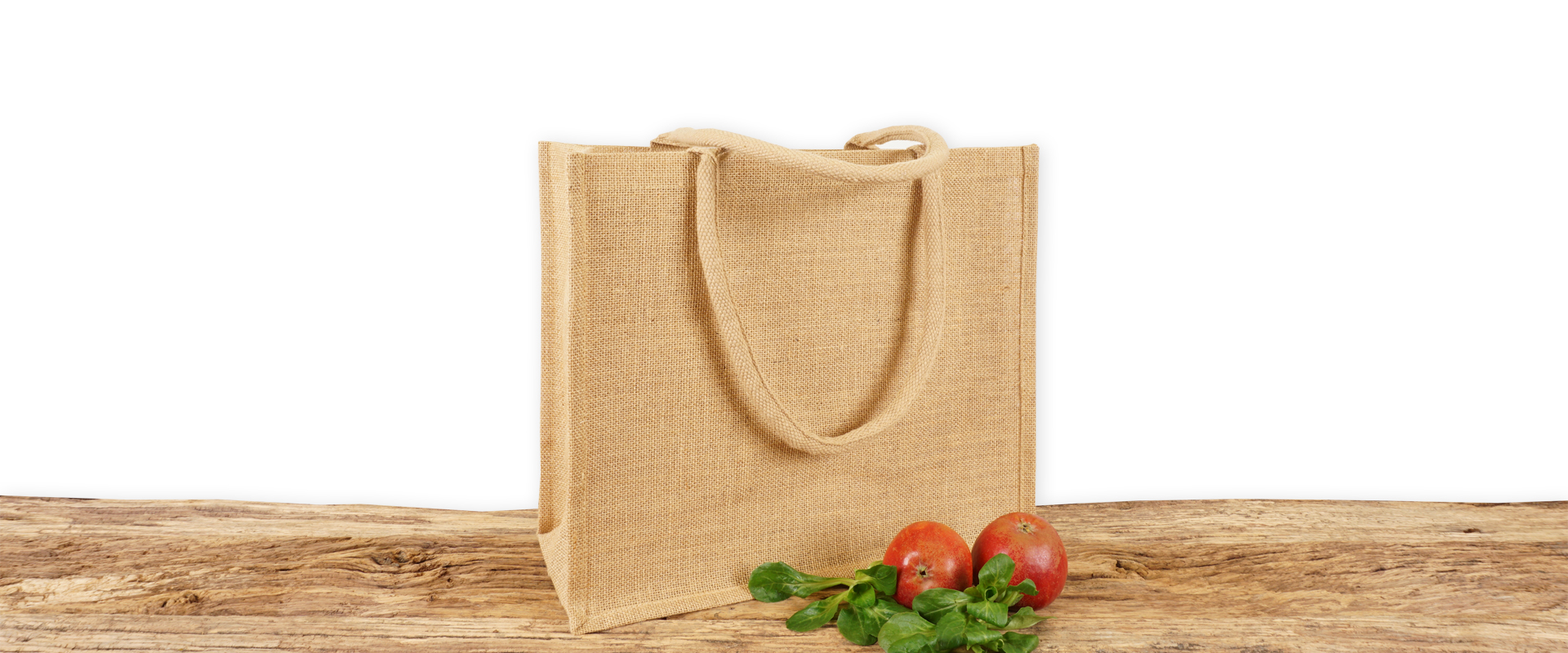 Einkaufstasche aus Jute zum Bedrucken, naturfarben mit Seiten-Bodenfalte, mittelgroß und biologisch gestärkt auf Holz.